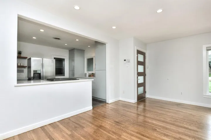Open dining area flows seamlessly between the kitchen and living area.