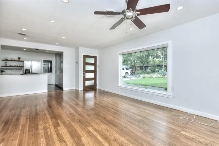 Look at these gleaming original white oak floors...NO CARPET anywhere in this home!
