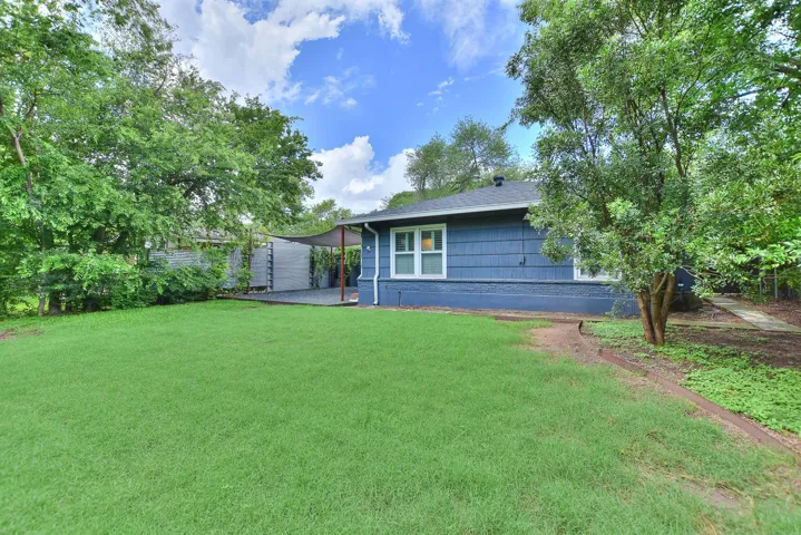 This home offers established lush landscaping and trees but leaves plenty of room to create your own personal spaces!