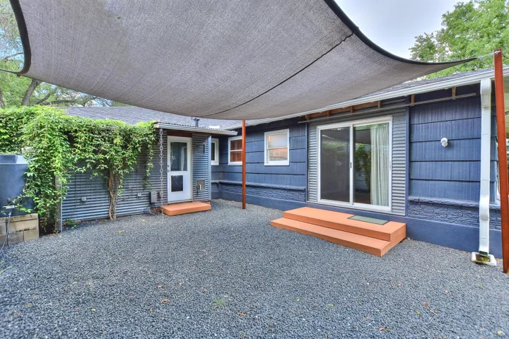 Large covered back patio area provides a great outdoor space to relax and entertain with 2 options for access!