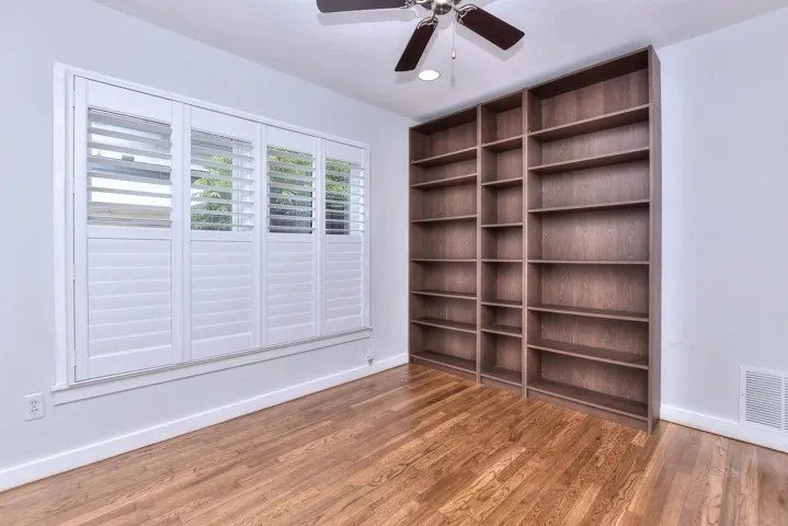 Bedroom #2 offers a great space for use as a home office or exercise room....note the built-in bookcases!