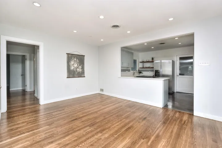 This flexible dining space is open to the kitchen and living area.