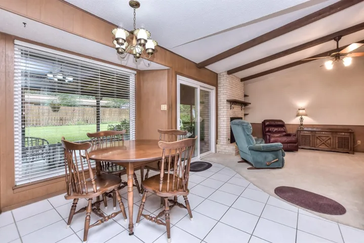 The dining area is large enough for a long rectangular table or smaller square/round/oval table.