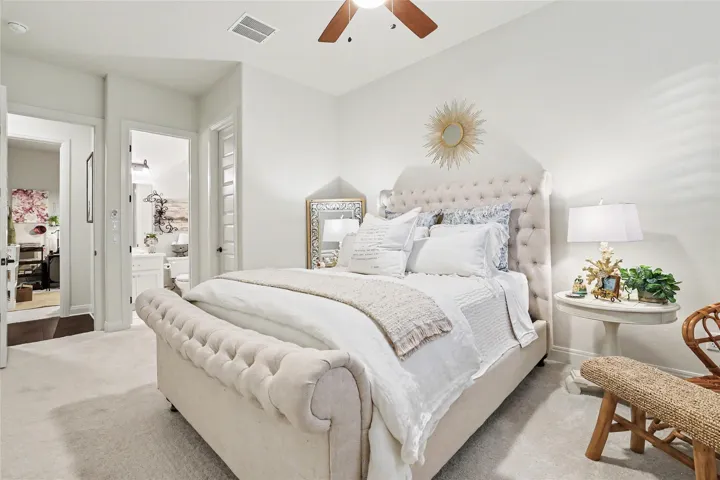 High ceilings in this comfortable bedroom retreat.