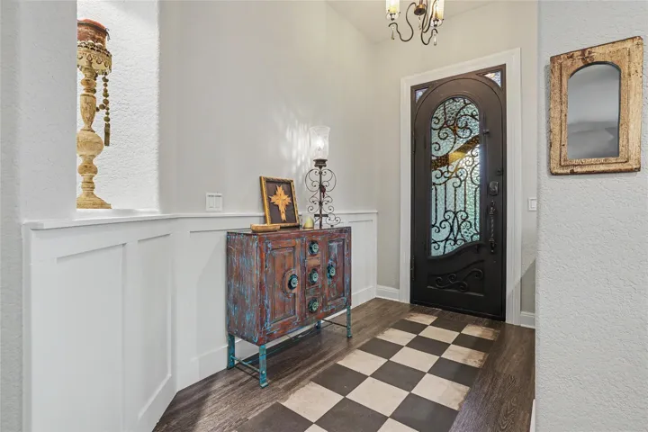 As you enter the foyer, you already start to feel at home with all light fixtures replaced and freshly painted walls...