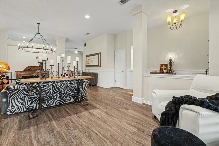 I actually love every room in this home, but this one is one of my favorites.  This large area could be one 2nd living area or it could be a dining area where the circular light fixture is the the rest being a living area....Up to you!