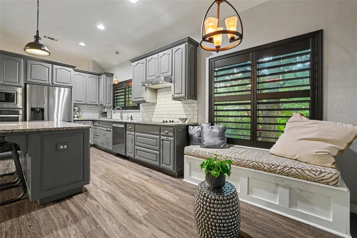 Breakfast room is in the front of this photo and the updated kitchen is in the background...