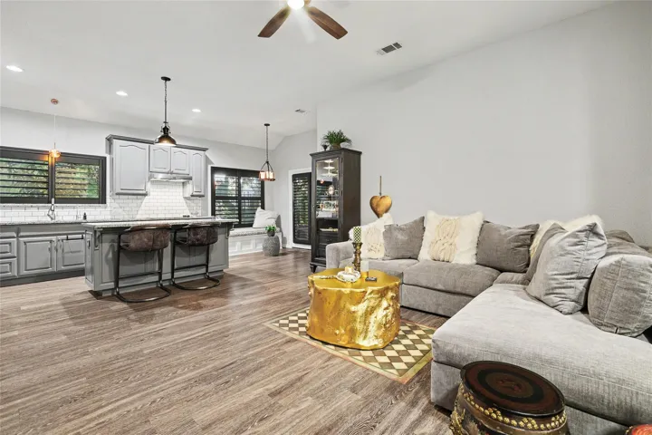 Back to the family room with a view to the kitchen serving areas....