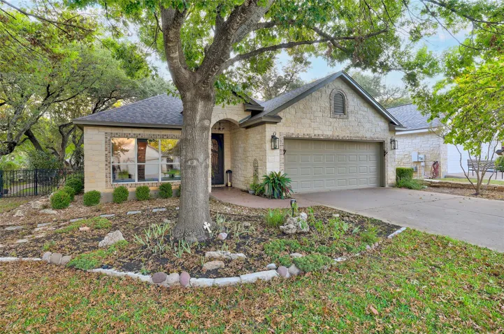 Situated on a corner lot on a quiet street...Pretty trees, deer come by to visit...These beds were freshly mulched, but with this heat, the leaves are starting to fall early this year...