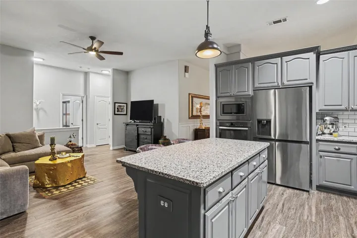 From the kitchen to the family room....Even when you are doing duties in the kitchen, you are included in what is going on in the family room...
