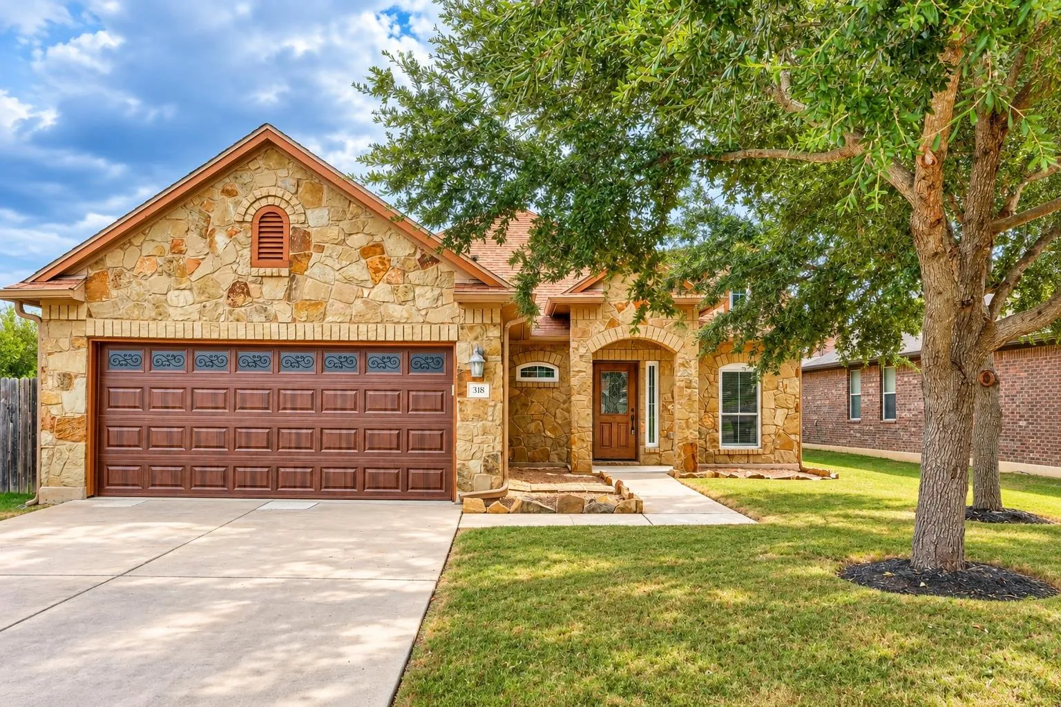 Photo of 318 BLOSSOM VALLEY STRM, Buda, TX, 78610
