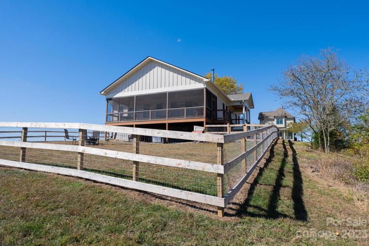 Main House Screed Porch and Fenced Yard