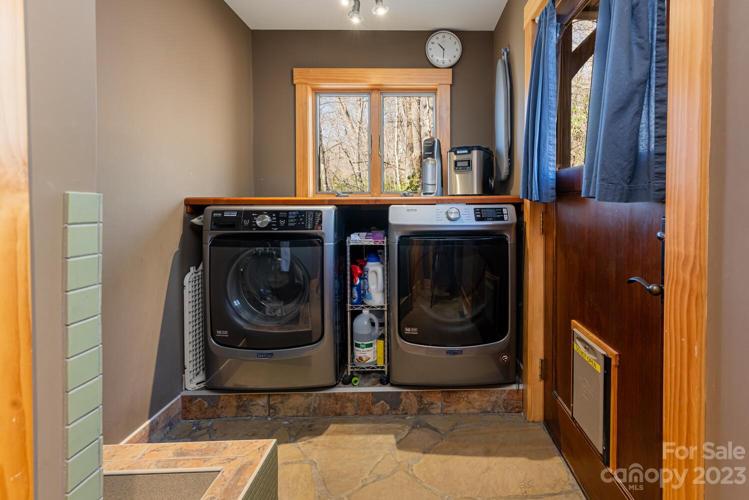 Main Level Laundry with Pet Washing/Mop Station