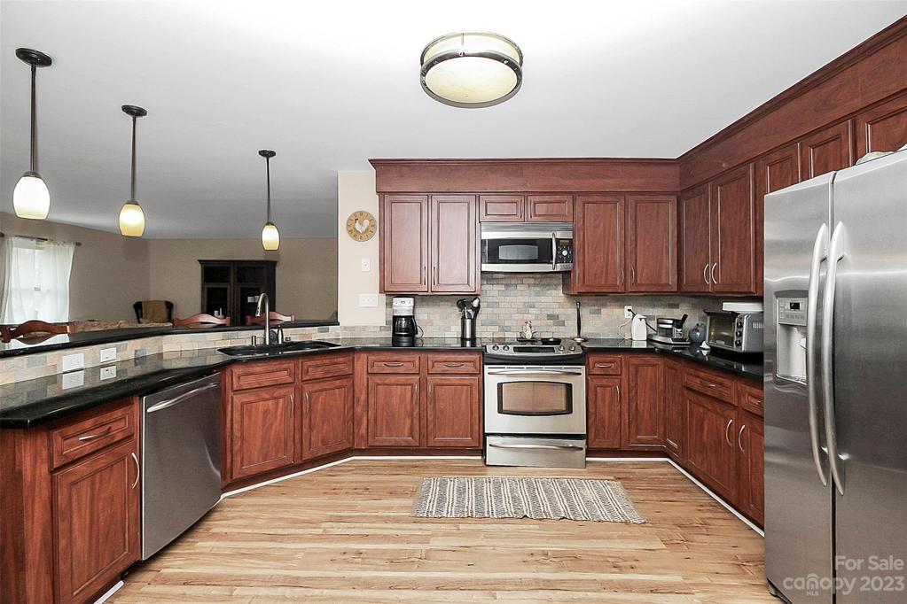 Stairway leading to upper level - half bath