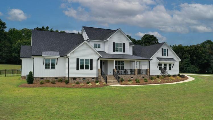 Modern Farmhouse living on 17.85 acres of peace and tranquility