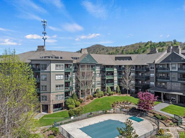 Enjoy summer with a pool right outside your condo.
