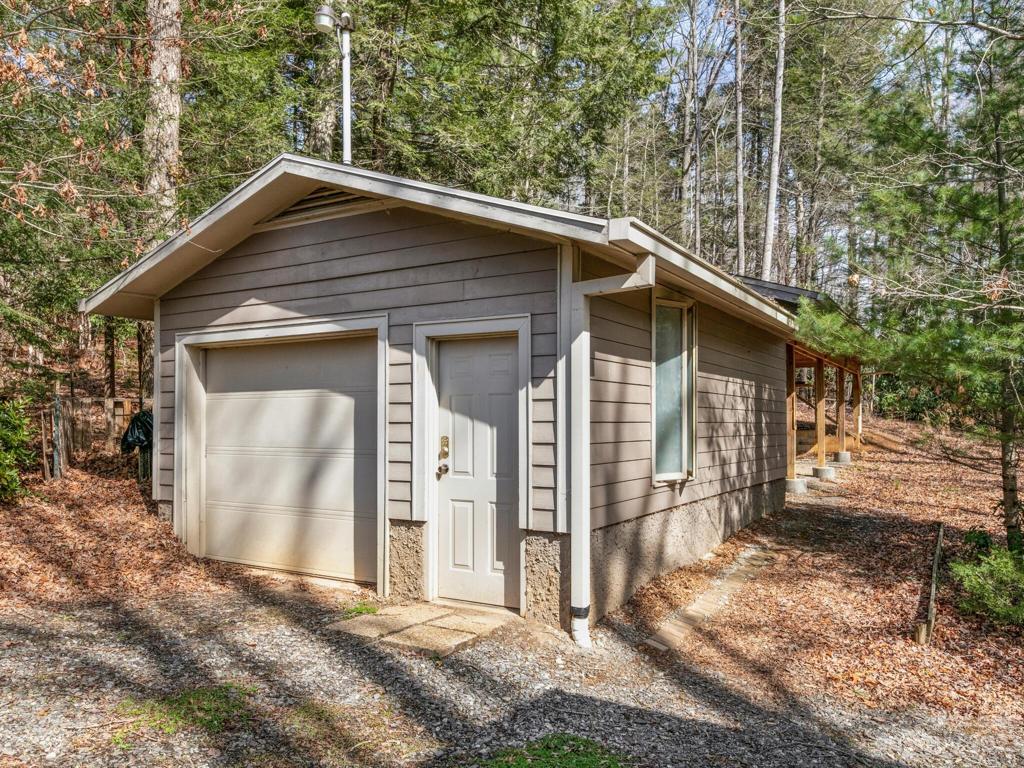 One Car Garage w/ 4 open bays behind