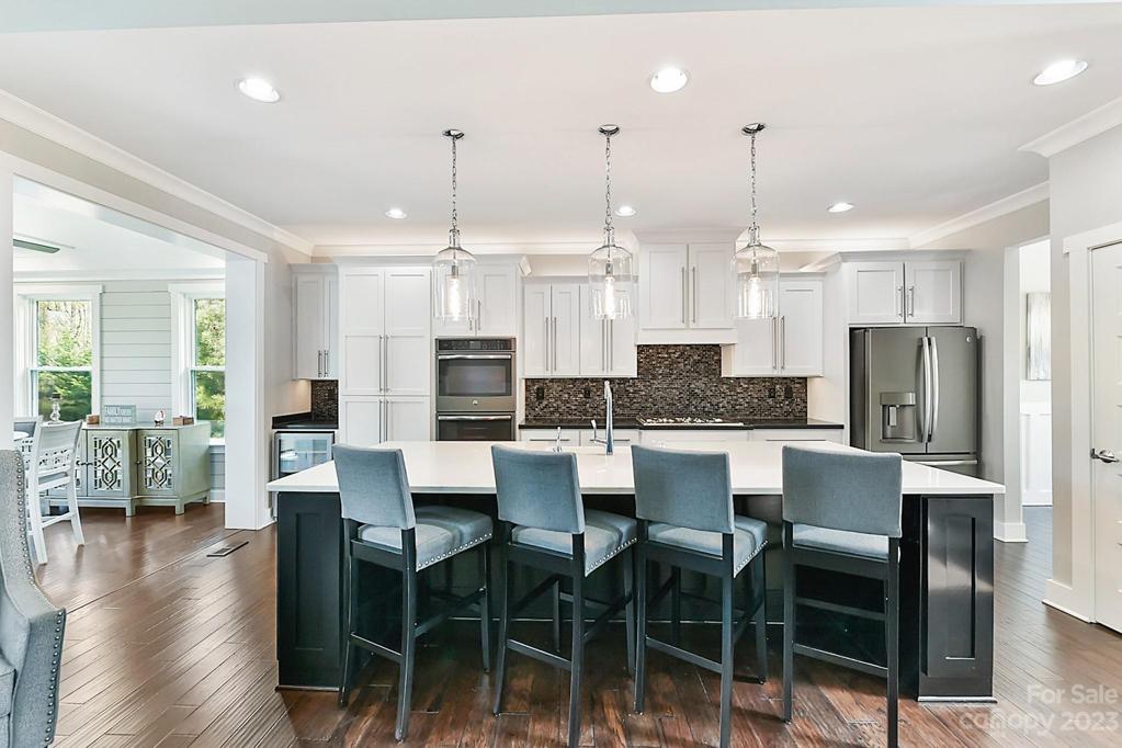 Large Island with Pendants, Quartz Counters, Farmhouse Sink