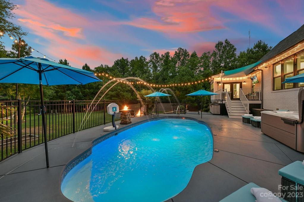 Twilight View of Pool and Lights