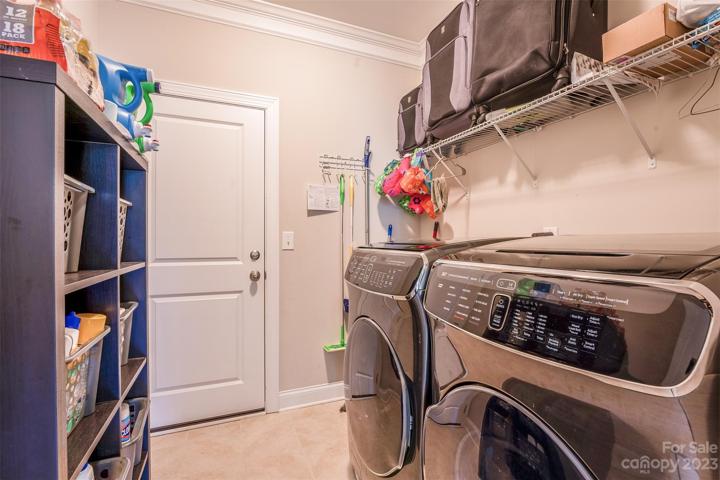 Laundry room - w/ fancy washer and dryer (gift from sellers)