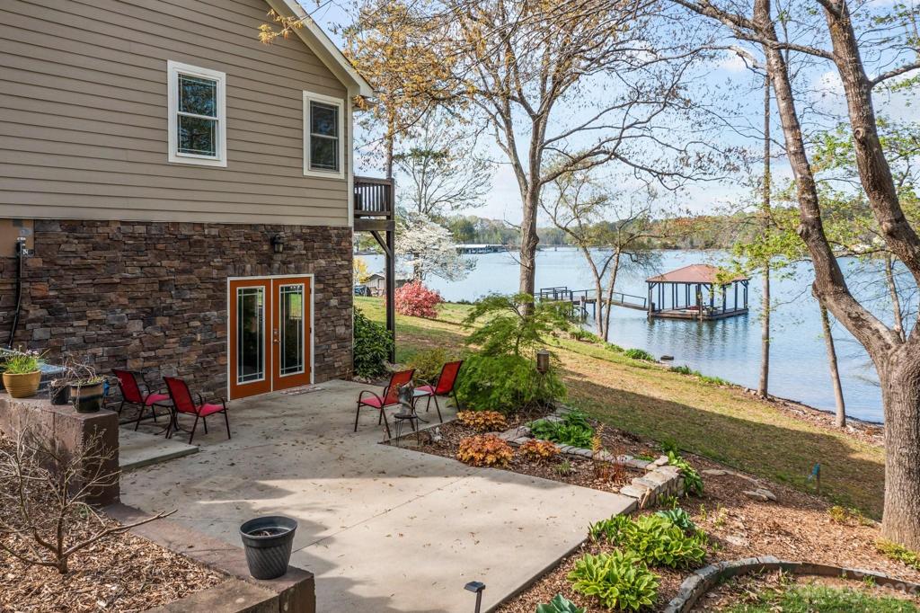 Side patio with basement access