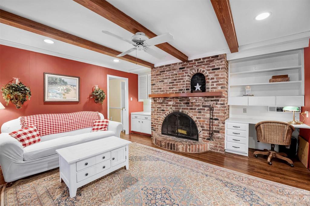 Den with wood burning fireplace!