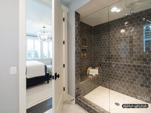 Step into owner suite spacious shower