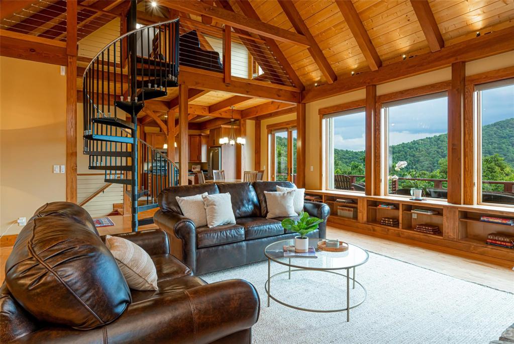 Its spiral staircase and cable railings add a fun and modern detail in the homes main living space