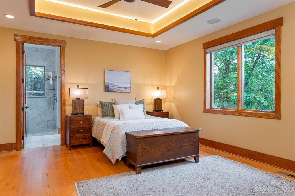 Spacious primary suite on the main level with 2 separate walk-in closets