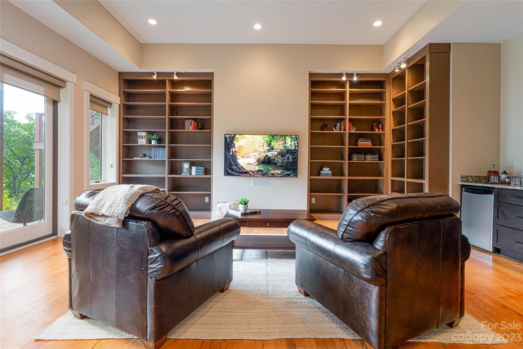 Lower level family room and bar area can be accessed by the elevator that services the lower level and main level.