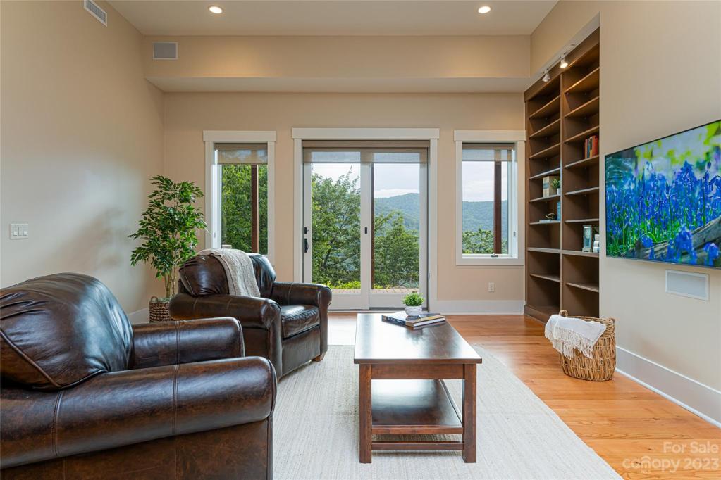 Walk out onto the Lower level patio with hot tub and firepit...