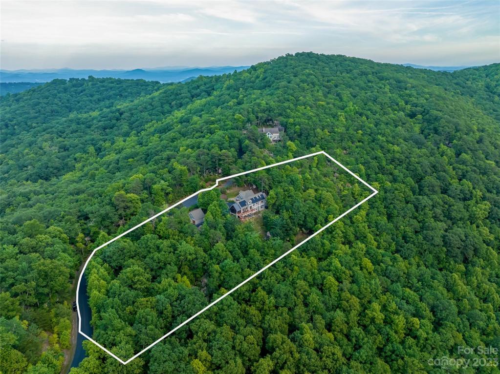 Escape the hustle and bustle and come home to your own slice of the mountains at 711 Blue Mist Way!