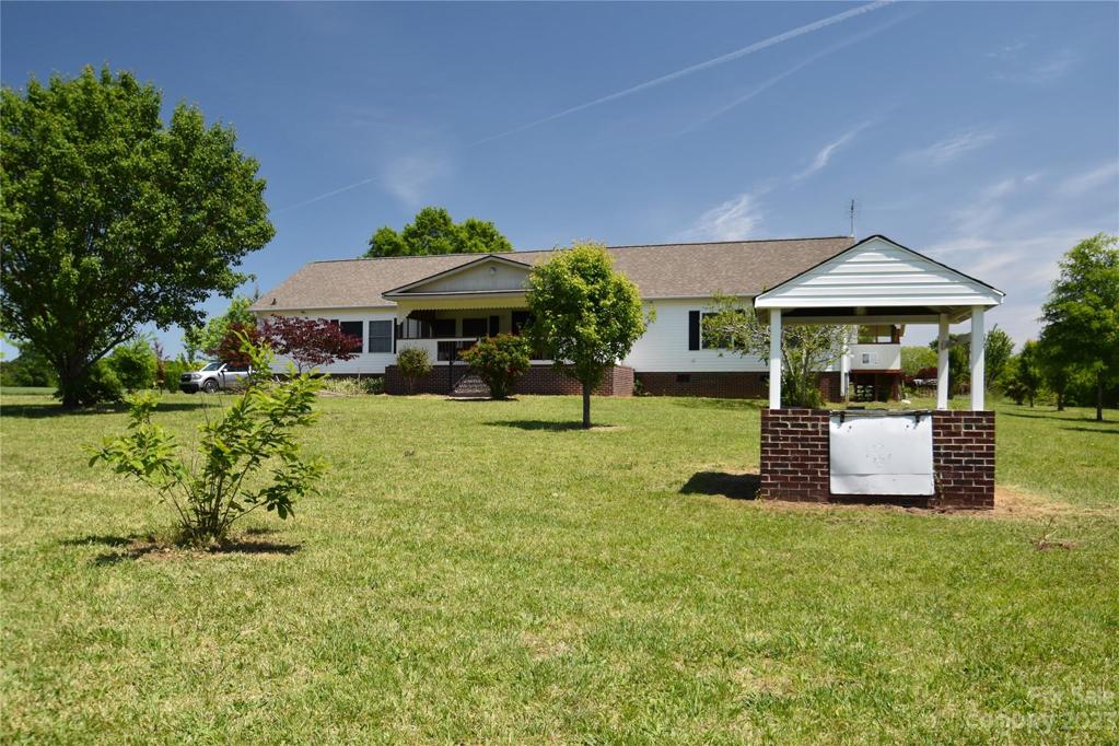 Well house in front yard