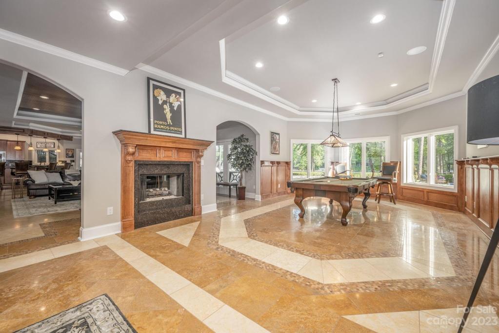 Waterfront Level Open Space  Billiard Room with see-Tru Fireplace.