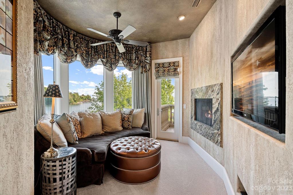 Primary sitting with double sided-fireplace