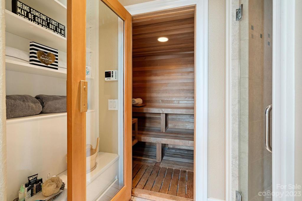 Multi person sauna with double bench and steam shower