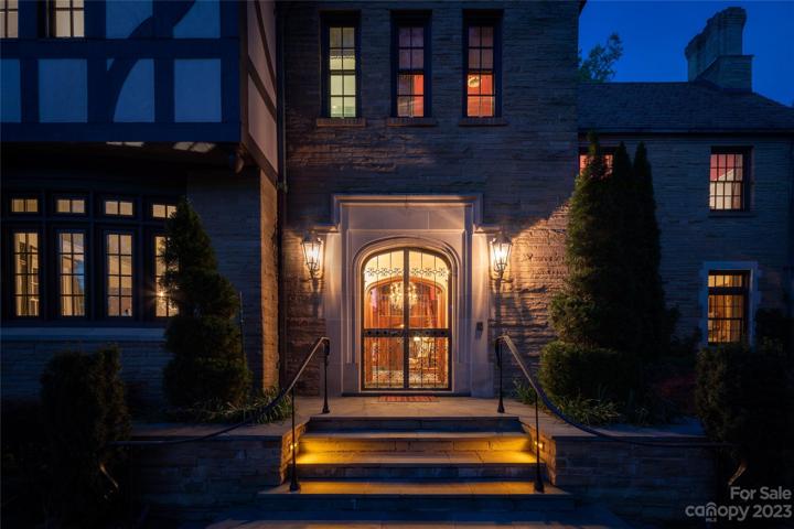The original William Dodge glass wrought iron doors create a magical threshold