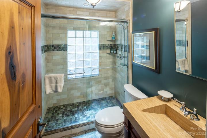 Gorgeous tiles (even on the ceiling!) in this guest bath