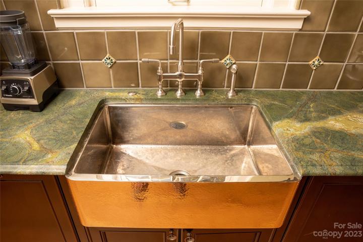 ...and this hand hammered copper (naturally antibacterial) apron front farm sink
