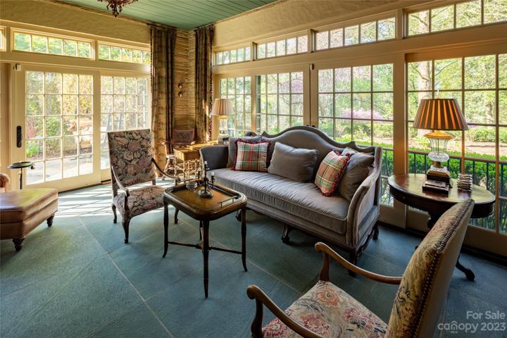 Natural light and a flourishing landscape embrace all who relax here. Note the easy flow access via that glass door to entertaining outside...