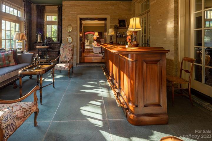From the Living Room, those French doors welcome family and friends alike to this convivial bar