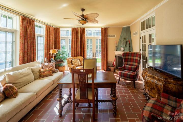 This sunroom also encourages relaxing times as well as an easy flow access to the gardens outside