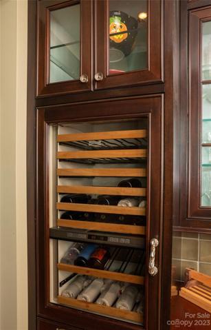 Conveniently equipped with a temperature controlled wine storage cabinet...