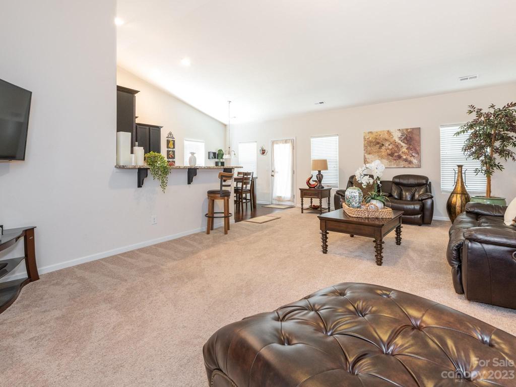 Living Room open to Dining and Kitchen
