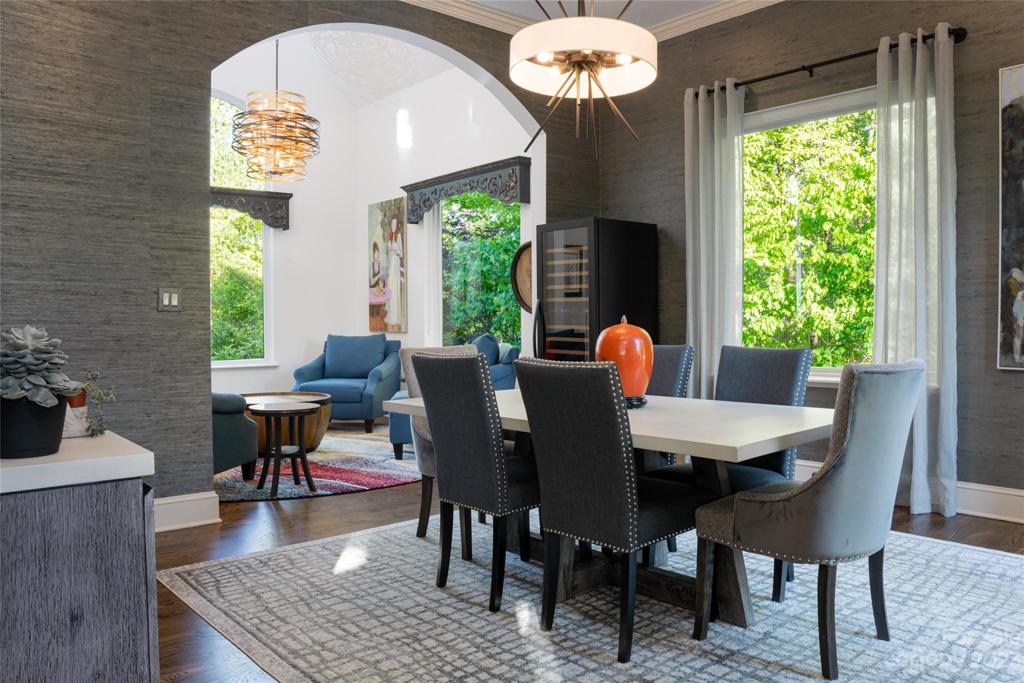 Rich wallpapers add warmth and create intimate spaces in this spacious home...