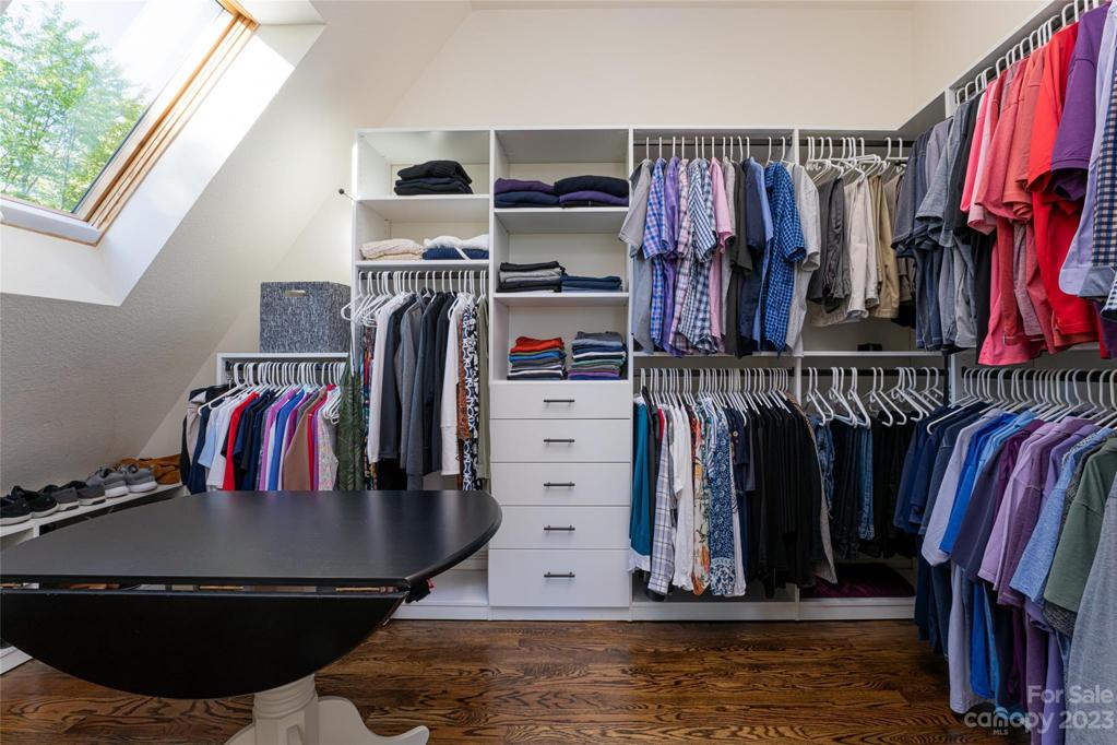 One of TWO walk-in closets of the primary suite...