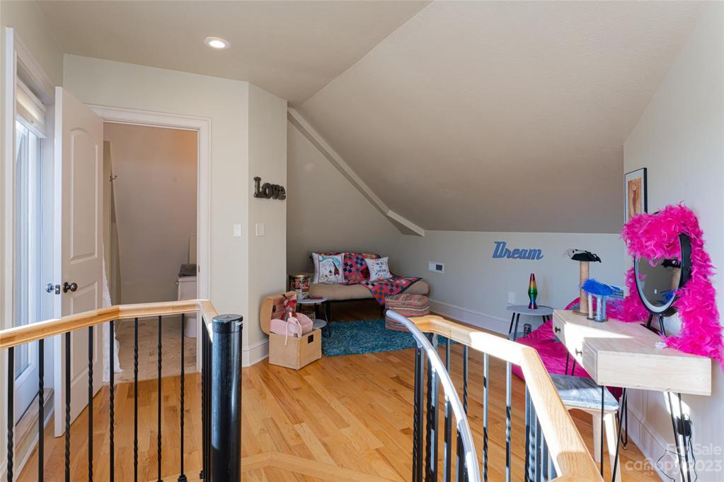 Go up the spiral staircase and find this... currently a dream playroom, the top-most floor with a full bath and private patio is screaming to be a meditation/yoga space!