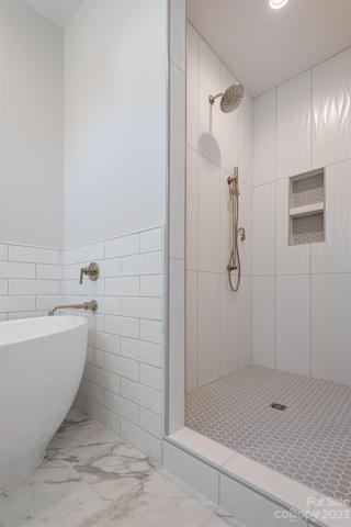 Primary bath with tub and walk-in shower