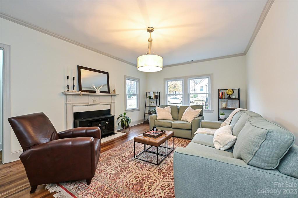Spacious living room with wood burning insert