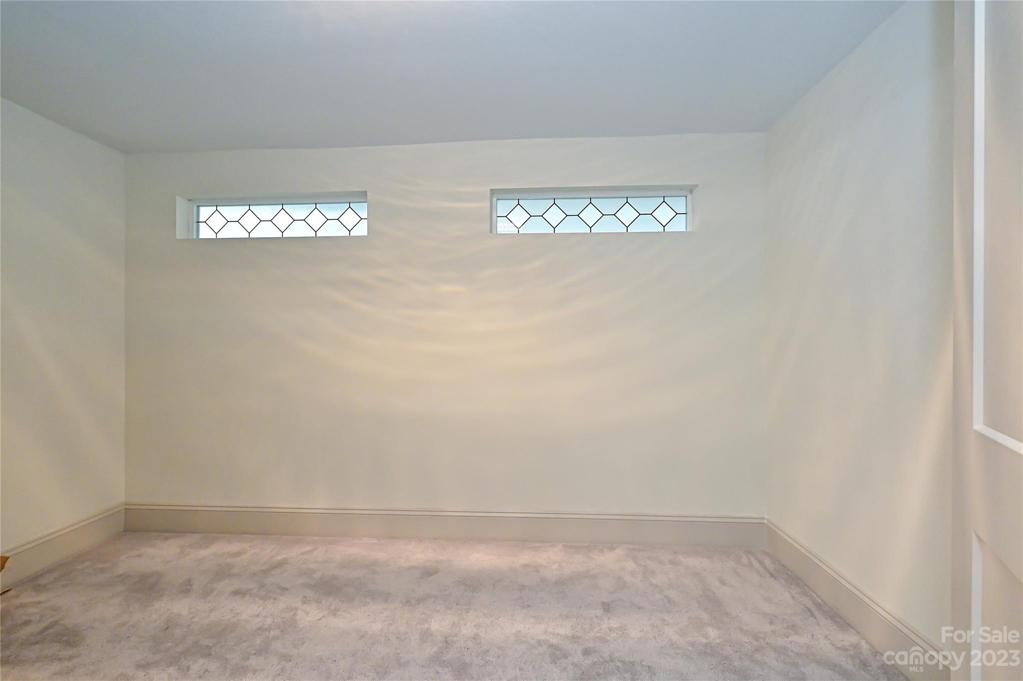 Imagine your dream closet in this double door primary walk in closet space.  A blank canvas ready for your design
